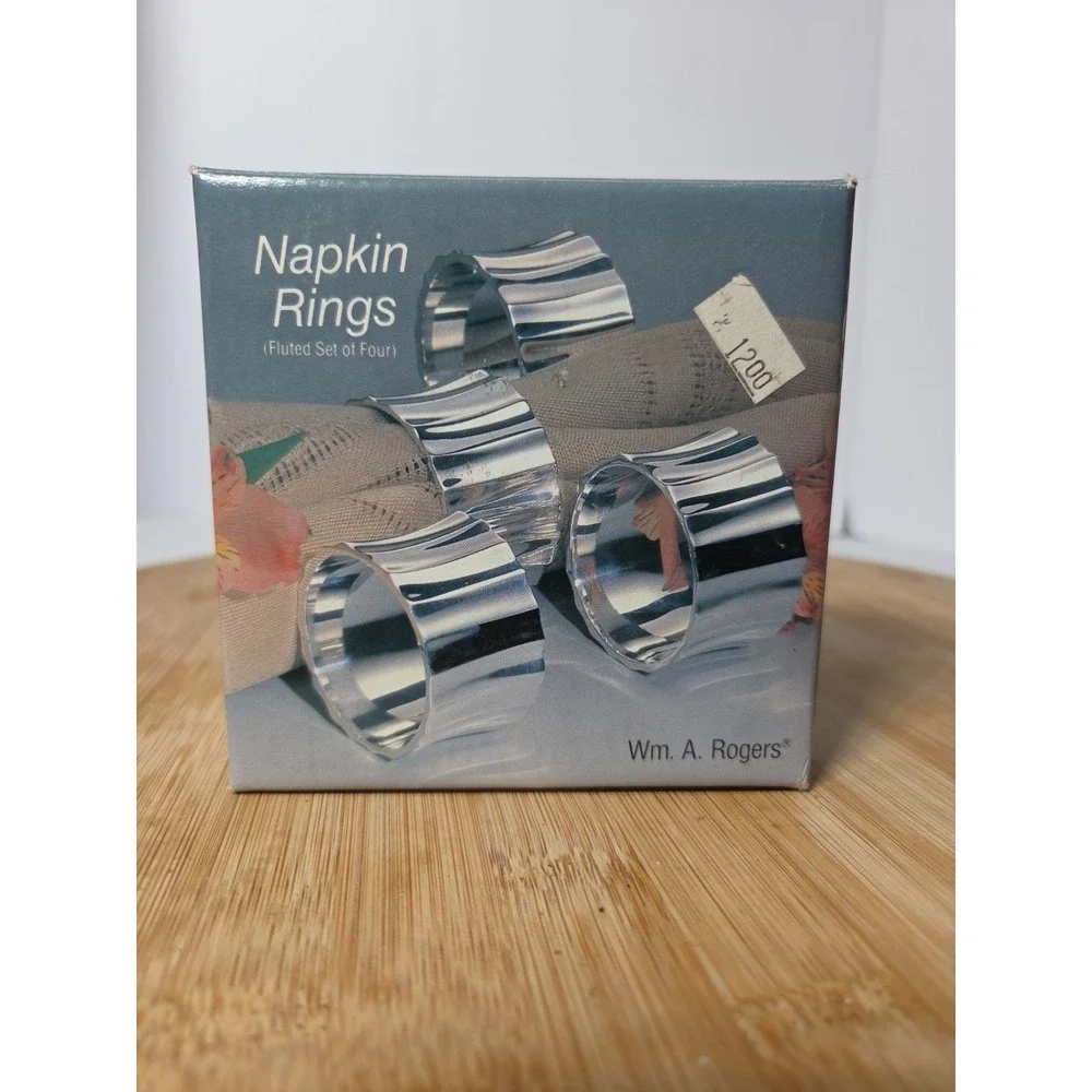 Vintage Set 4 Oneida Silversmiths NY Wm Rogers Silverplate Napkin Rings NIB